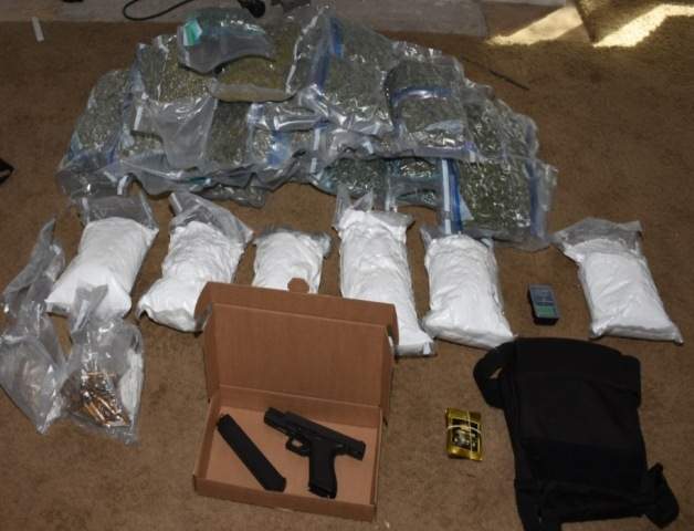Officers with 'Project Endure' seized drugs, loaded handguns, ammunition, a heavy armour ballistic vest, $100,000, and a 2009 Maserati.