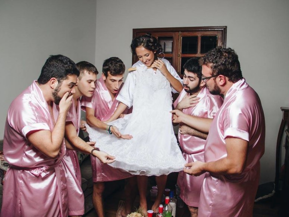 When Rebeca Brantes couldn't get her girlfriends together for a bridal photo shoot, she improvised with a group of her best male friends. The results were hilarious and heartwarming. 