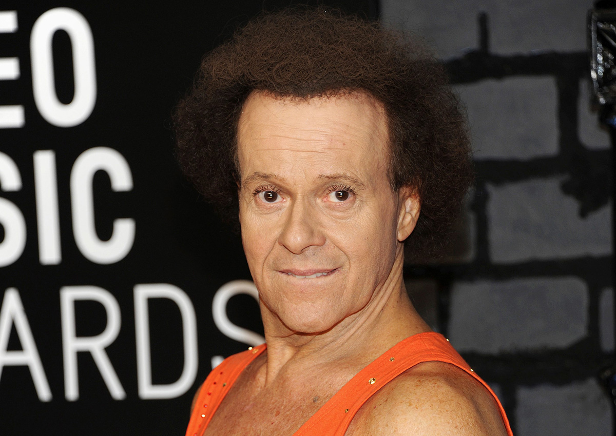 In this Aug. 25, 2013 file photo, Richard Simmons arrives at the MTV Video Music Awards in the Brooklyn borough of New York.  