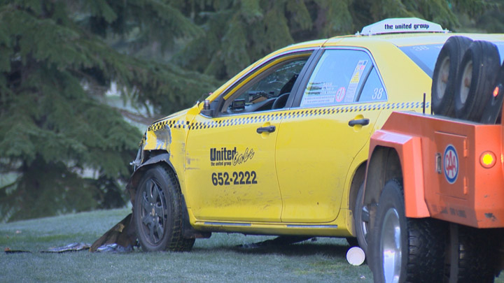 Alleged driver of stolen taxi crashes into fence while trying to avoid being captured by Saskatoon police.