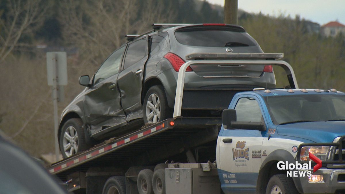 A stolen Nissan Murano was involved in several hit-and-run collisions before crashing into another vehicle after running a red light in Calgary on Tuesday. 