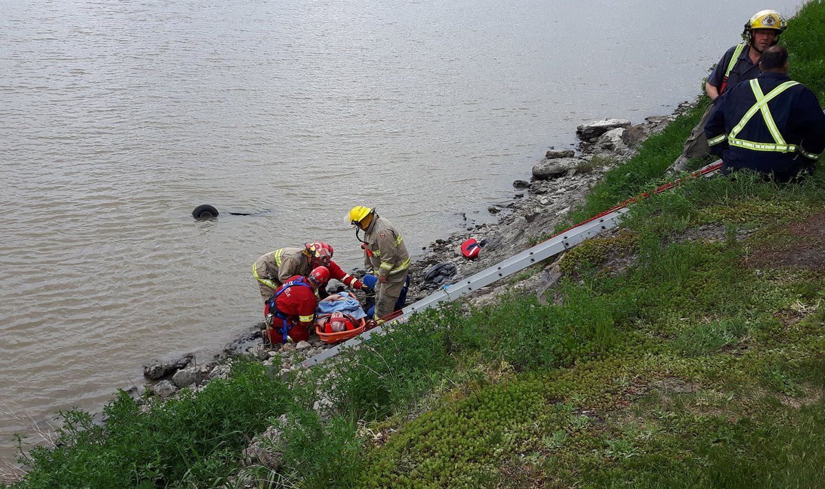 A Selkirk man is in hospital recovering after falling in to the Red River on his lawn mower.