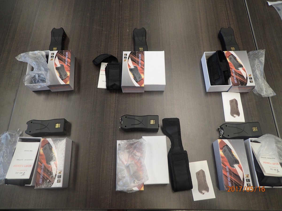 A Brandon man has been arrested in connection with 12 stun guns that were recovered by the Canada Border Services Agency. Six of the stun guns were disguised as iPhones.