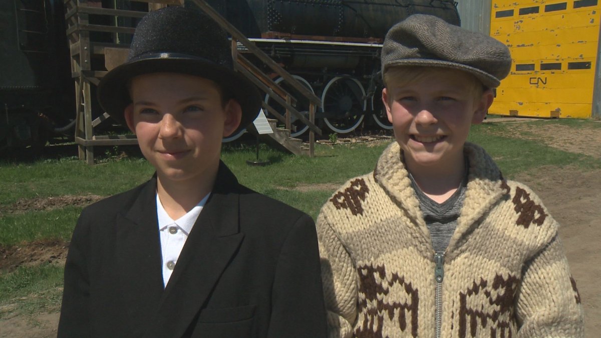 A pair of Edmonton students led a historical re-enactment of last spike at the Alberta Railway Museum Sunday.