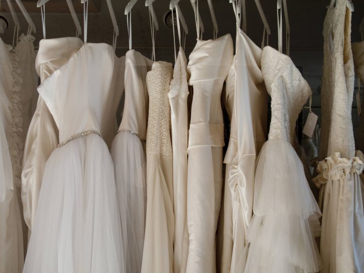 Stock photo of bridal gowns on display.