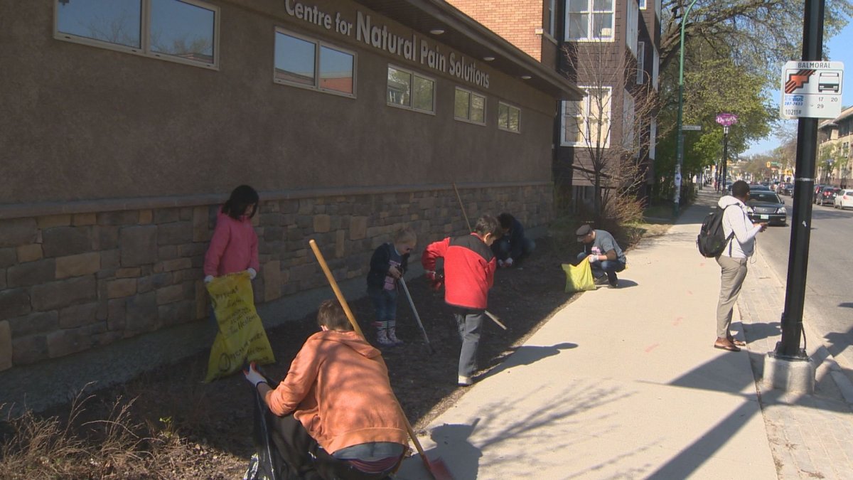 The West Broadway community got together to cleanup the area on Saturday.