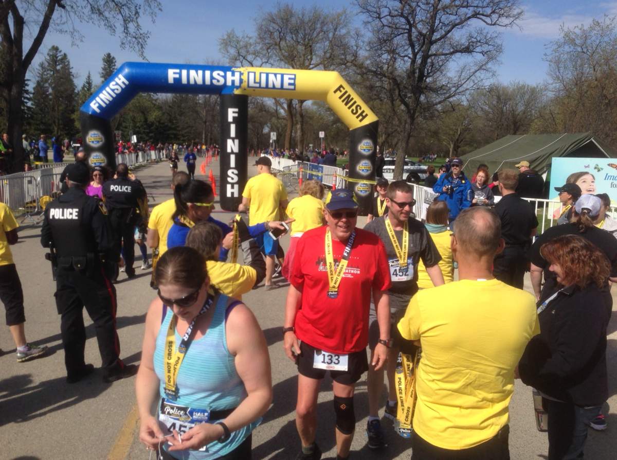 Thousands pack Assiniboine Park for annual police half marathon - image