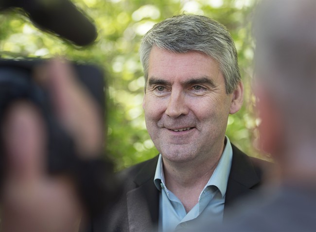 File - Nova Scotia Premier Stephen McNeil talks with reporters after vote in the provincial election at the community centre in Granville Centre, N.S. on Tuesday, May 30, 2017.