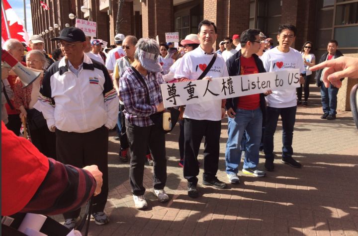 About 200 people gathered in downtown Edmonton Saturday morning to take part in a march and rally expressing concern and anger over city council's decision to plan for concentrating supervised injection sites north of the downtown core.