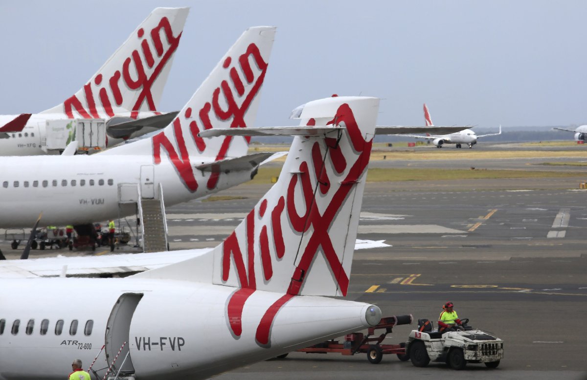 A picture made available Feb. 16, 2016 shows Virgin Australia aircraft on the tarmac at Melbourne Tullamarine Airport, Melbourne, Australia, Dec. 13, 2015. 