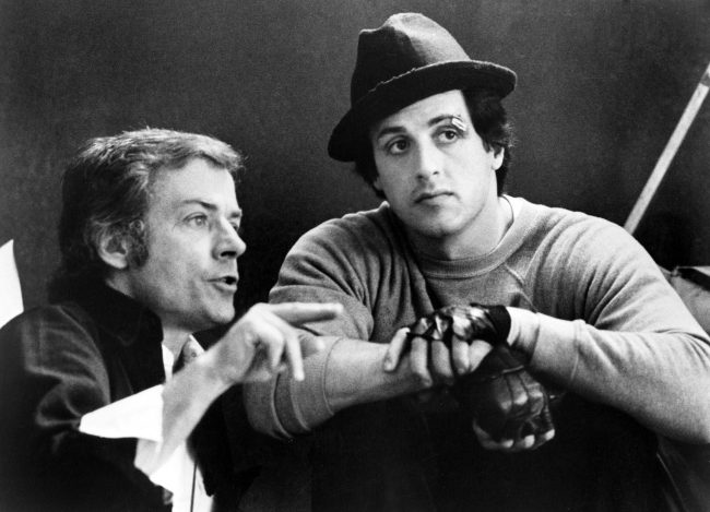 John G. Avildsen with actor Sylvester Stallone on the set of "Rocky," 1976.