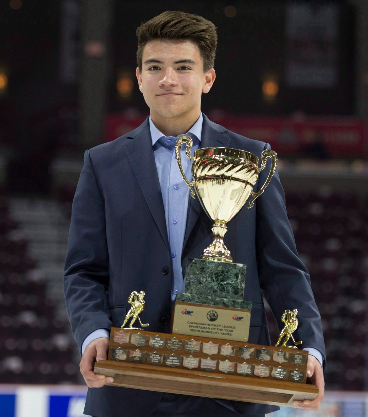 CHL Sportsman of the Year award recipient Nick Suzuki from the Owen Sound Attack holds his trophy following a media availability at the Memorial Cup Saturday May 27, 2017 in Windsor.