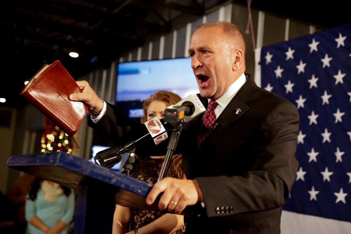 FILE - In this Dec. 10, 2016, file photo, Republican candidate Clay Higgins, with his wife, Becca, addresses supporters after his victory in Louisiana's 3rd congressional district run-off election in Lake Charles, La. Higgins says a terror attack in London over the weekend shows that the free world Äúis at war with Islamic horrorÄù and says Äúradicalized Islamic suspectsÄù should be hunted down and killed. Higgins says in a Facebook post:  "Kill them all. For the sake of all that is good and righteous. Kill them all.".