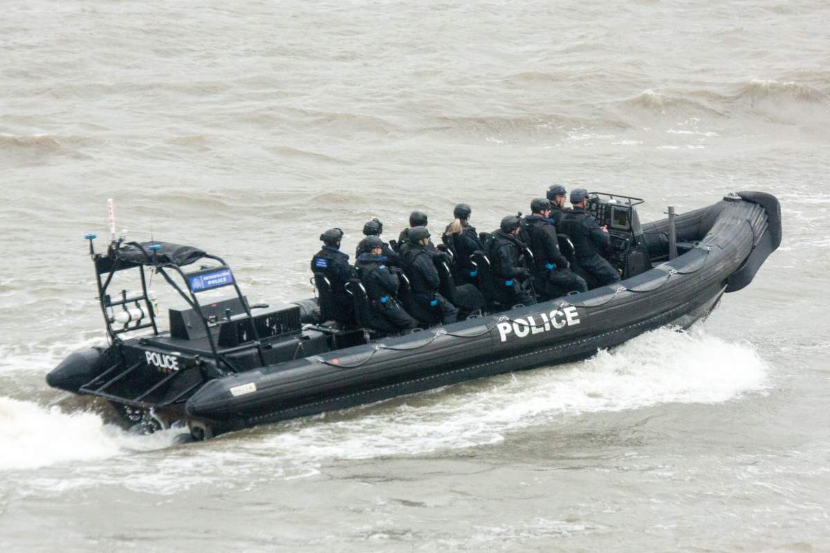 A police rib on the River Thames on the day an eighth body from the London Bridge terror attack was recovered from the river near Limehouse. It is believed to be that of French national Xavier Thomas.