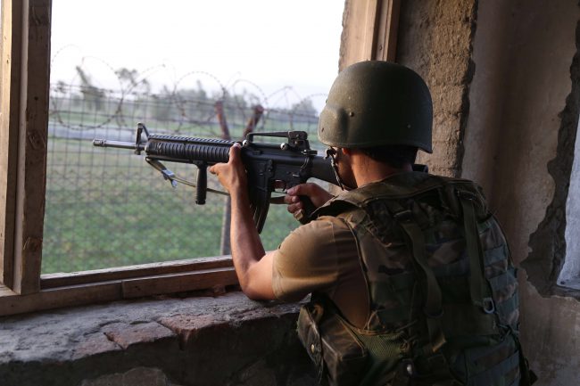 An Afghan Army soldier mans a check point in Jalalabad, the provincial capital of Nangarhar province, Afghanistan, June 10, 2017. 
