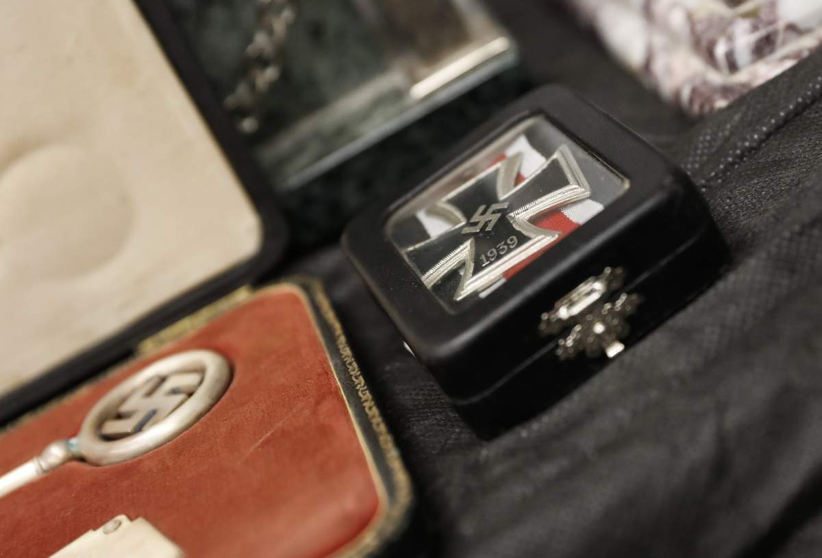 Detail of artifacts bearing Nazi symbols that were recovered by the Argentine Federal Police (PFA), displayed during an event at the headquarters of the Delegation of Argentinean Israeli Associations (DAIA) in Buenos Aires, Argentina, 19 June 2017.