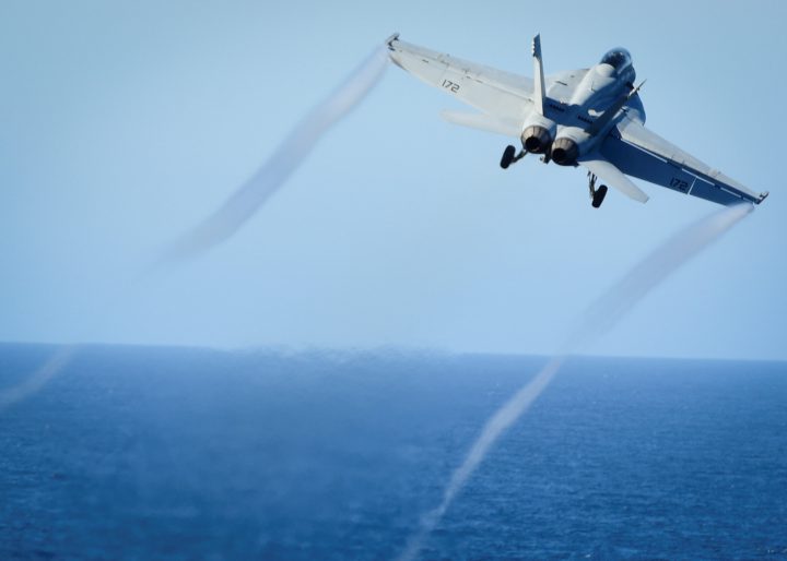 An F/A-18E Super Hornet takes off from the flight deck of the aircraft carrier USS Nimitz on Oct. 29, 2016. 