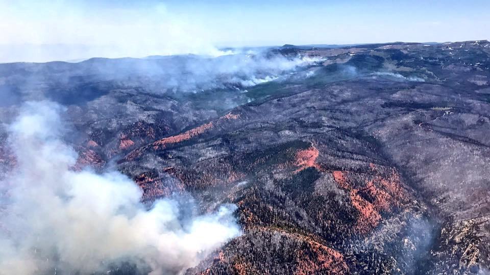 An aerial photo of wildfires burning across almost 50,000 acres near the ski resort of Brian Head, about 245 miles south of Salt Lake City, Utah is shown in this handout photo provided June 27, 2017.  
