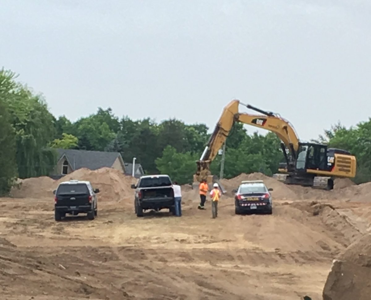 Police were called to the scene at the Parkview Heights development project near Oxbow Drive and Queen Street around 2:30 p.m.