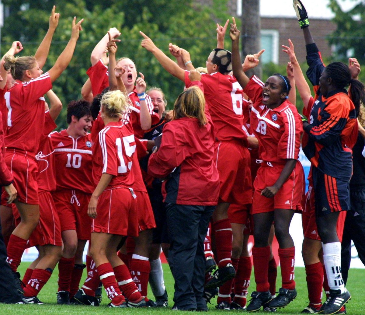 Ontario's female soccer team celebrate their gold medal at the 2001 Canada Summer Games in London.