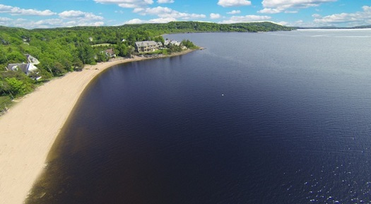 The house features 250 feet of private waterfront access with deep water anchorage.