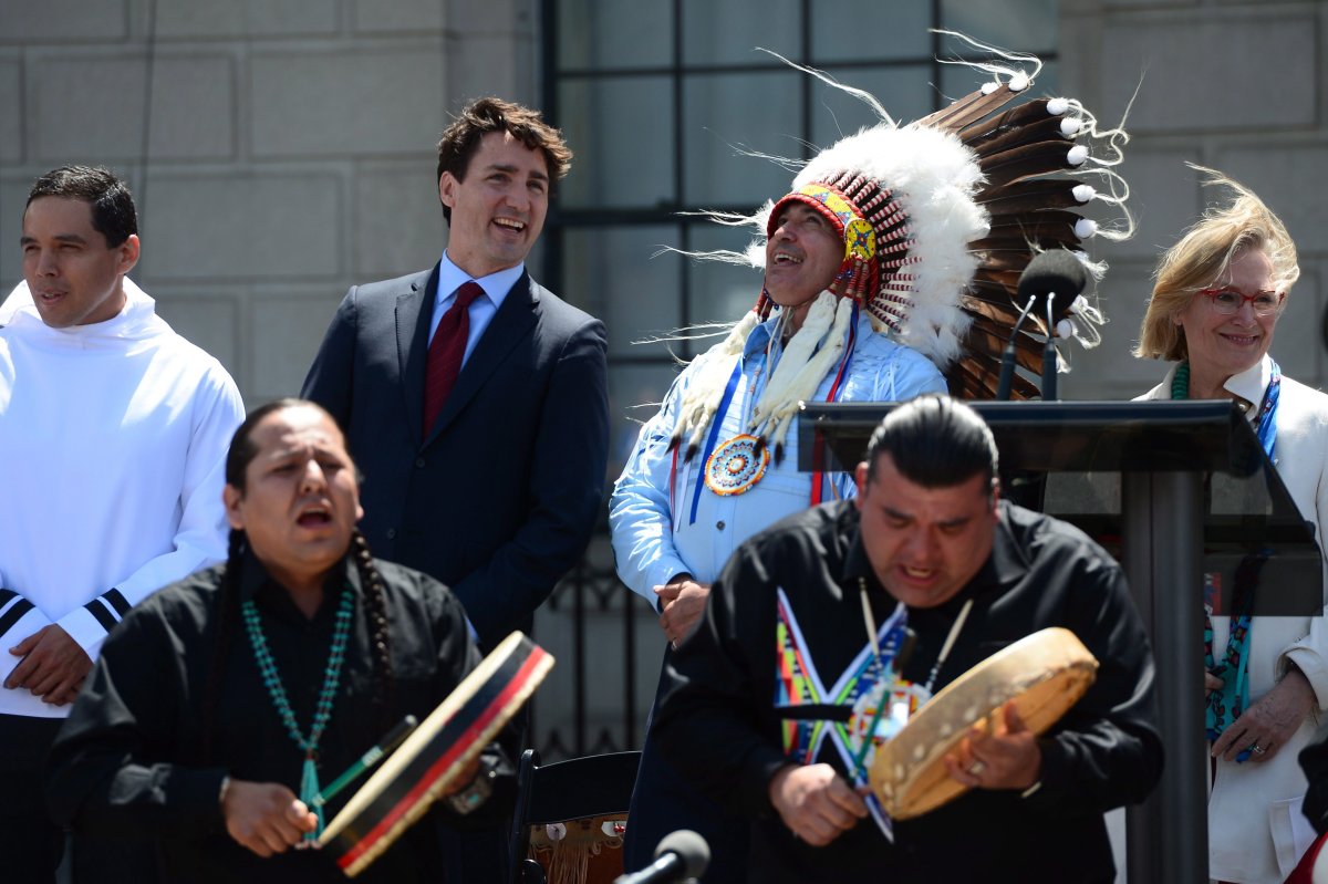 Prime Minister Justin Trudeau and Perry Bellegarde, national chief of the Assembly of First Nations, celebrate National Indigenous Peoples Day in Ottawa on Wednesday, June 21, 2017. THE CANADIAN PRESS/Sean Kilpatrick.