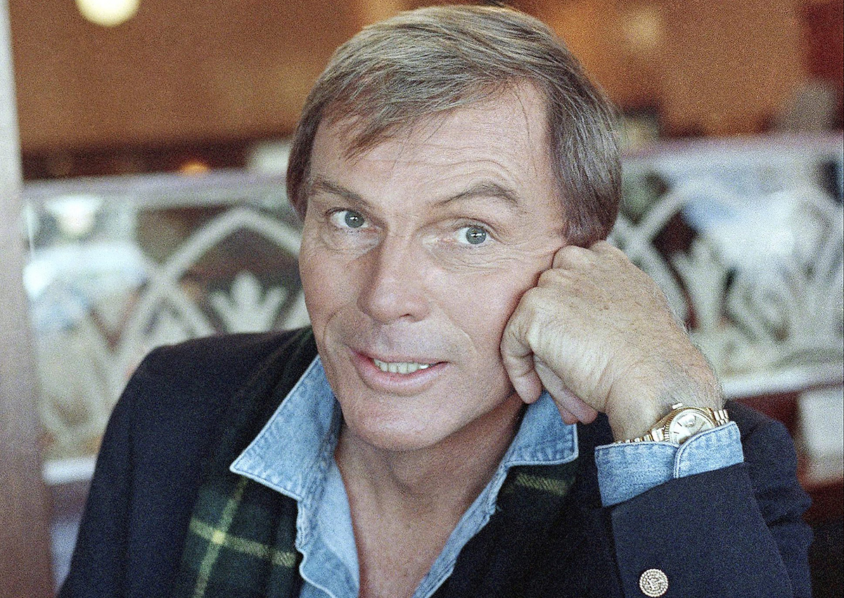 In this Dec. 11, 1985 file photo, Adam West poses for a photo in Los Angeles. On Saturday, June 10, 2017, his family said the actor, who portrayed Batman in a 1960s TV series, has died at age 88. 