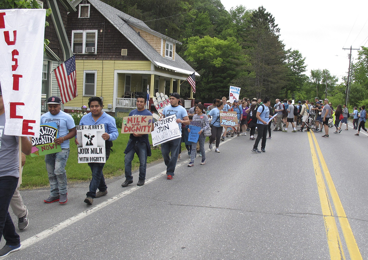 Scores of dairy farm workers and activists marching in Montpelier, Vt., on Saturday June, 17, 2017. 