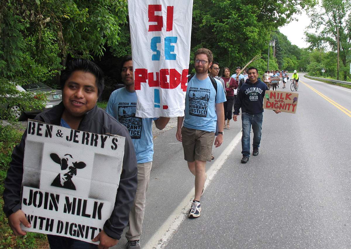 Scores of dairy farm workers and activists marching in Montpelier, Vt., on Saturday June, 17, 2017.