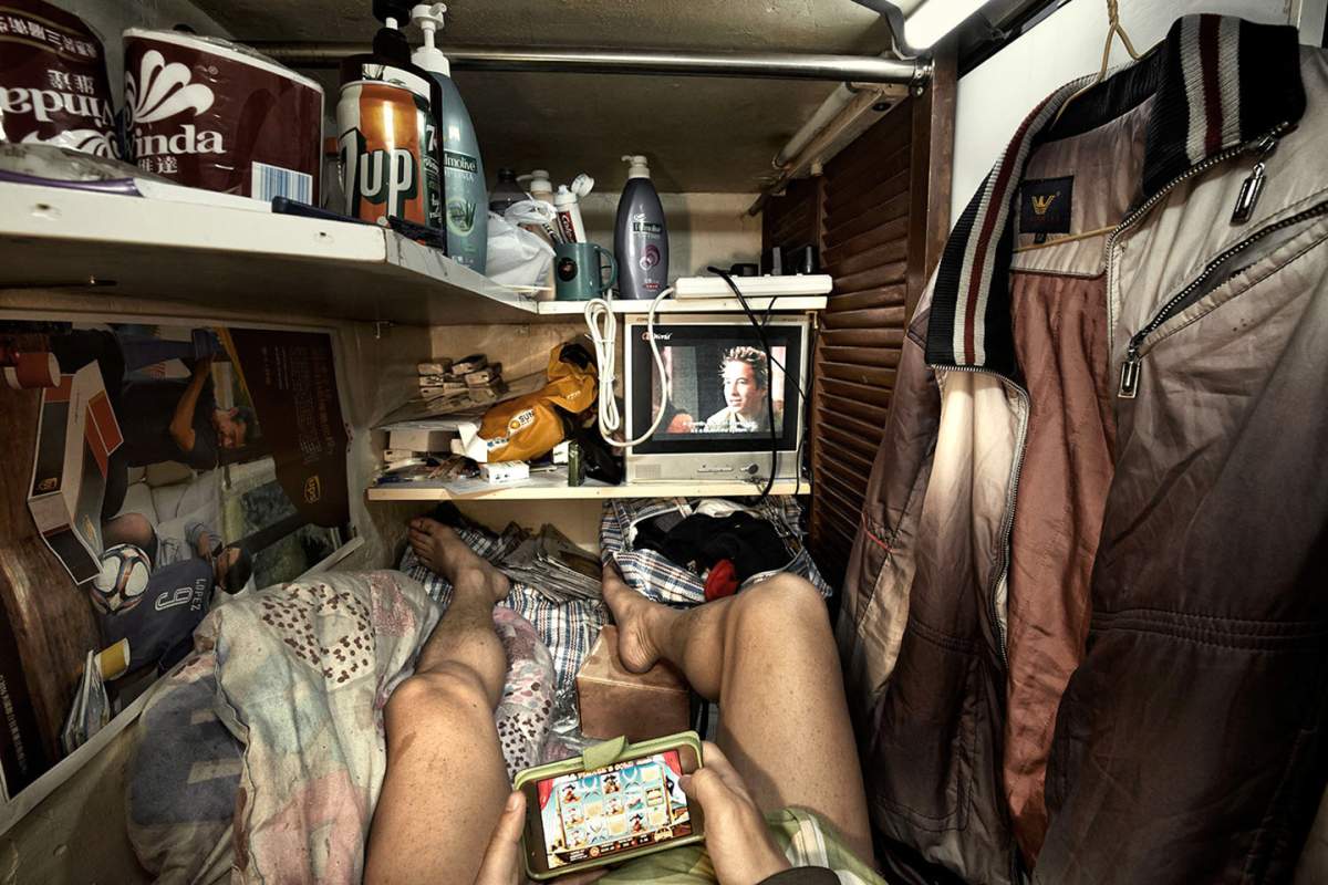 A photo by Ontario-trained photographer Benny Lam shows the cramped conditions in which low-income people live in Hong Kong.