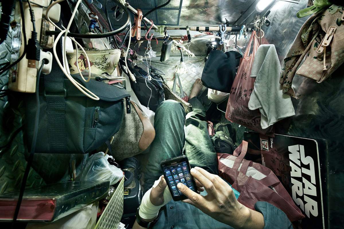 A photo by Ontario-trained photographer Benny Lam shows the cramped conditions in which low-income people live in Hong Kong.