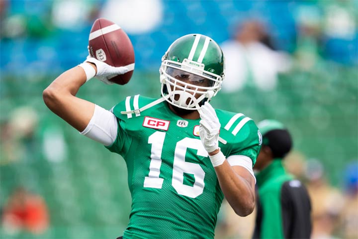 Brandon Bridge of the Saskatchewan Roughriders throws a pass in pre-game warmup for the game at Mosaic Stadium on September 4, 2016 in Regina.