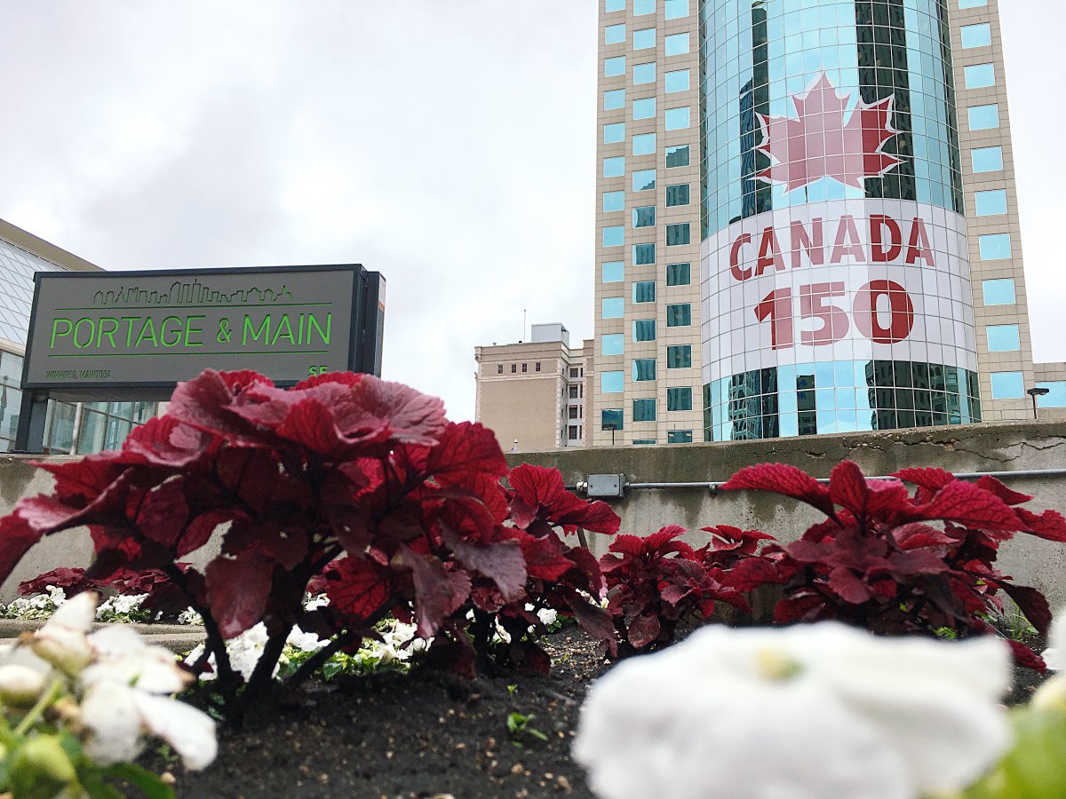 Canada 150 sign unveiled at 201 Portage Avenue Wednesday morning. 