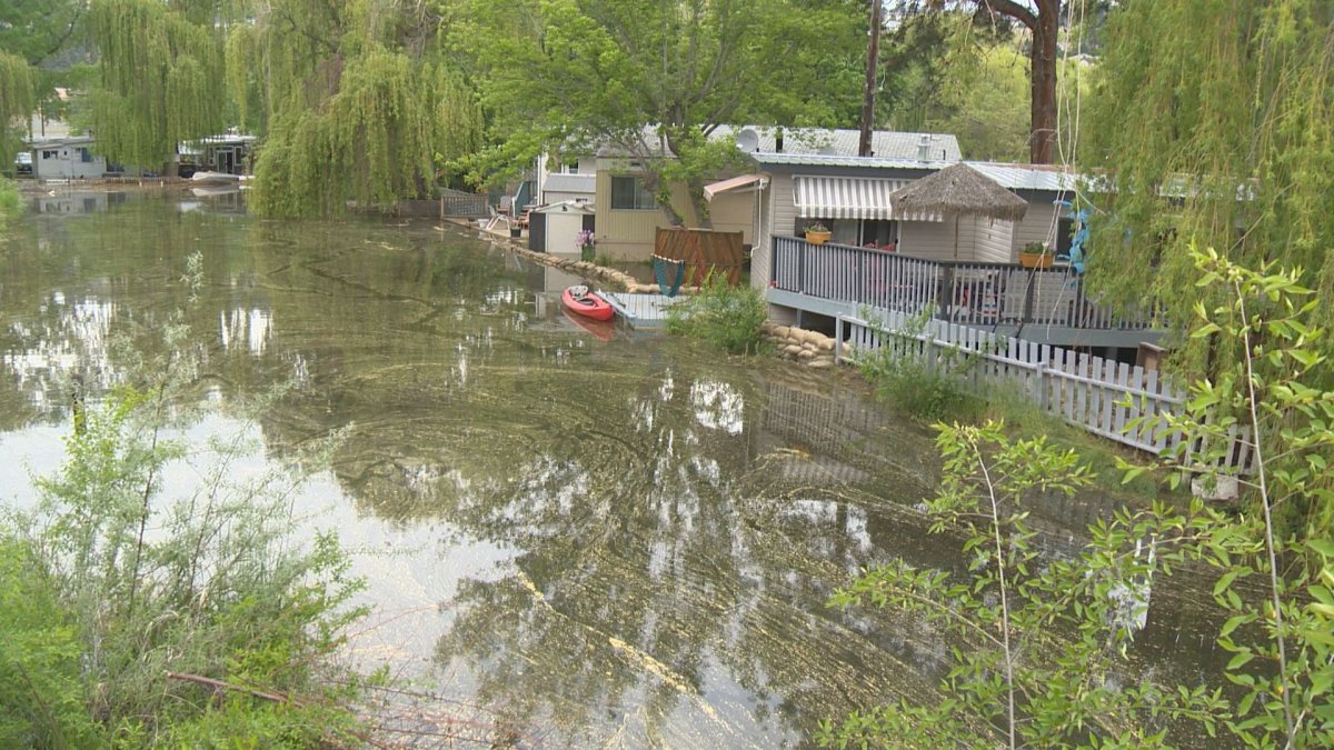A canal in West Kelowna's Green Bay neighbourhood, flooding nearby homes.