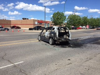 There was quite a commotion on Quance St. Wednesday after a car caught fire near the GoodLife Fitness.