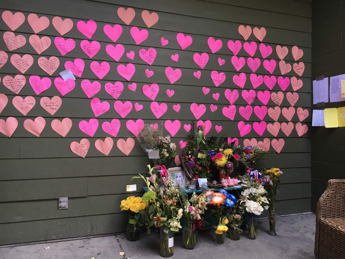 A memorial for Chrissy Archibald continues to grow at Calgary Alpha House Society, where she used to work as a social worker.