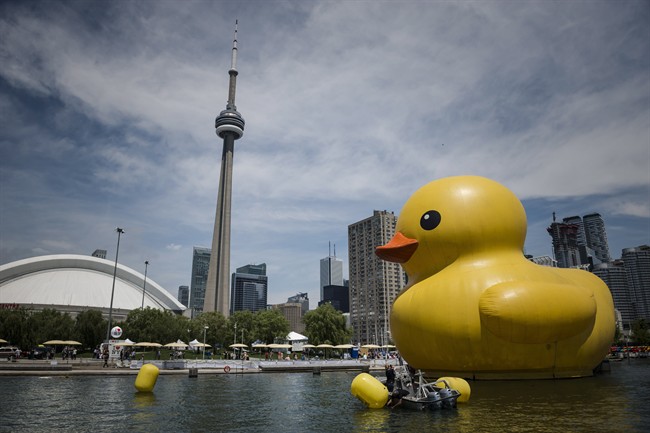 A giant inflatable duck sits on Toronto's Harbourfront as part of the Redpath Waterfront Festival, on Friday, June 30, 2017.