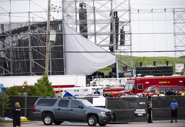 Emergency personnel on scene near a collapsed stage at Downsview Park in Toronto on Saturday, June 16, 2012.