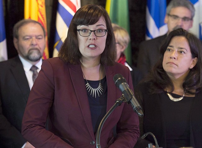 Alberta Justice Minister Kathleen Ganley fields a question at a news conference of a meeting of federal, provincial and territorial justice and public safety ministers in Halifax on Friday, Oct. 14, 2016.