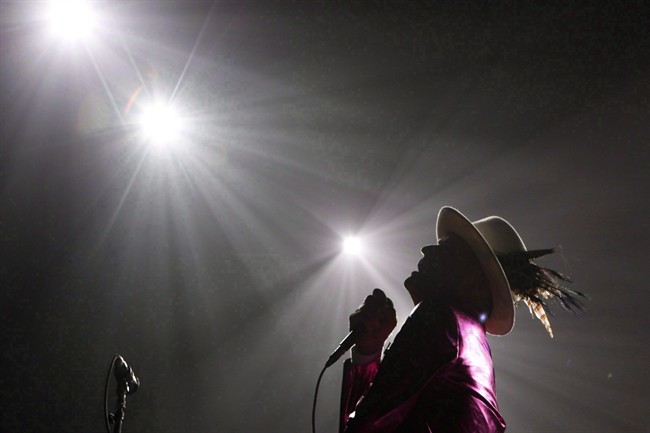 The Tragically Hip's Gord Downie, performs during the first stop of the Man Machine Poem Tour at the Save-On-Foods Memorial Centre in Victoria, B.C., Friday, July 22, 2016.