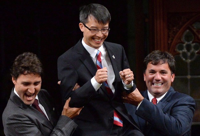 MP Arnold Chan, seen above with Justin Trudeau and MP Dominic LeBlanc in 2014, has passed away following a battle with cancer.