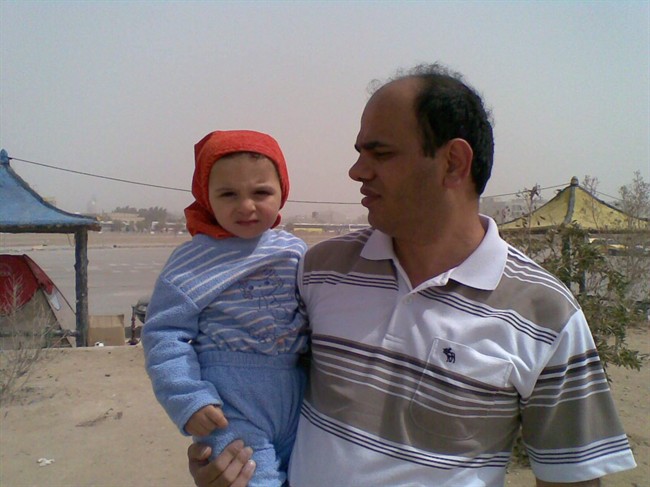 Ahmad Nourani Shallo and his son Koorosh are shown in this undated handout photo. 