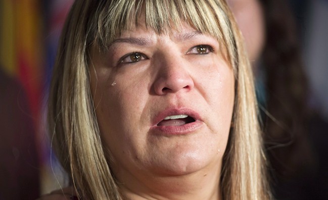 A tear rolls down the cheek of Bernadette Smith, from Winnipeg as she talks about the Missing and Murdered Indigineous Women inquiry on Parliament Hill in Ottawaw on December 8, 2015.