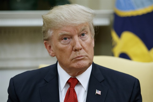 President Donald Trump listens as Indian Prime Minister Narendra Modi speaks during a meeting in the Oval Office of the White House in Washington, Monday, June 26, 2017. 