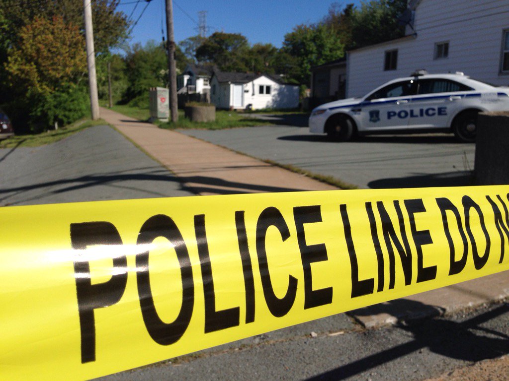 Police remain on the scene of a suspicious death at Albro Lake Road in Dartmouth .