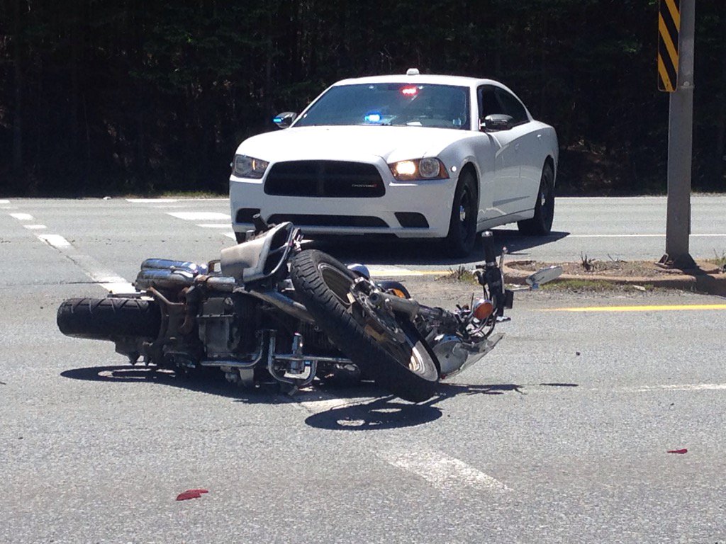 Police are investigating after a collision between a motorcycle and an SUV.