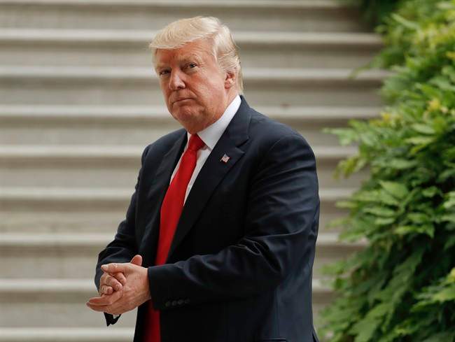 President Donald Trump walks back into the White House in Washington, Wednesday, June 7, 2017, following his arrival on Marine One helicopter. Trump was returning from Cincinnati, where he talking about overhauling aging infrastructure.