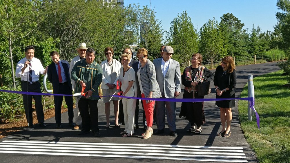 Government officials attend a ribbon cutting ceremony to open Trillium Park and William G. Davis Trail at Ontario Place on June 19, 2017.