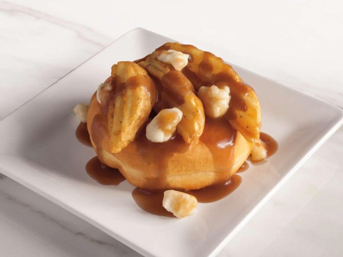 Tim Hortons introduces the poutine donut in honour of Canada's 150th birthday.