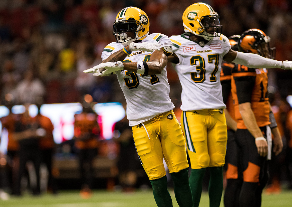 Edmonton Eskimos players Garry Peters and Kenny Ladler react to a missed point during CFL action between the Eskimos and Lions in Vancouver on June 24, 2017.